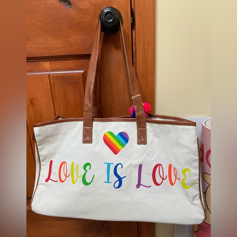 Live is love tote by Magid handbags 18” x 5” x 11” item no. 1302436